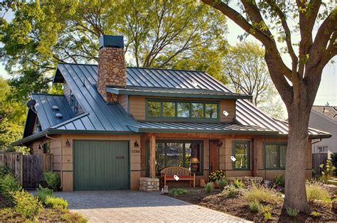 green siding house with brick and green metal roof|green metal roof exterior homes.